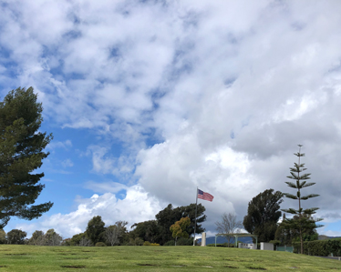 Photo of the flag and clouds in the sky